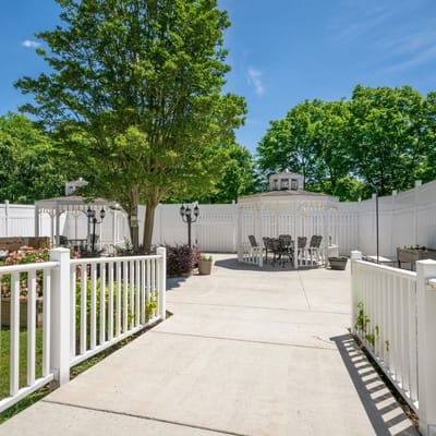 Outdoor area with seating and greenery