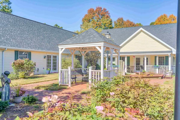 Outdoor gazebo in a landscaped garden area