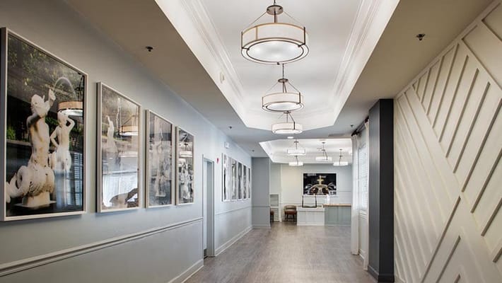 Bright interior hallway with framed artwork