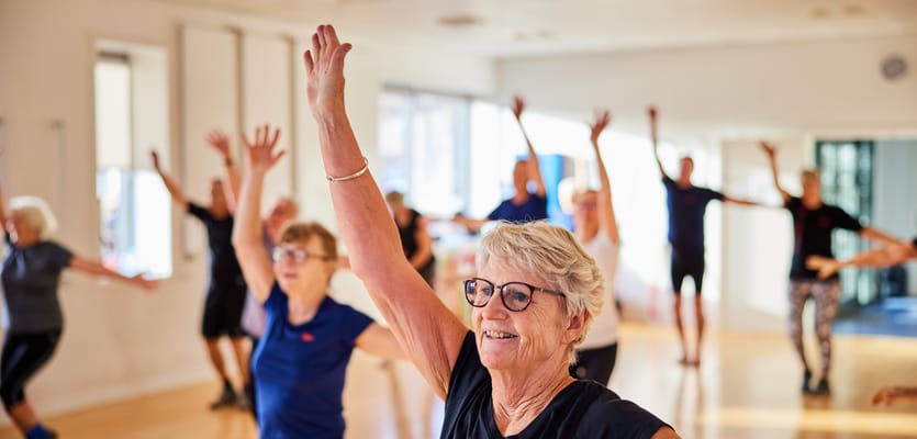 Seniors participating in an exercise class