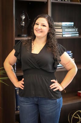 Staff member smiling in a common area