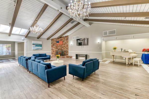 Bright common area with seating and decor