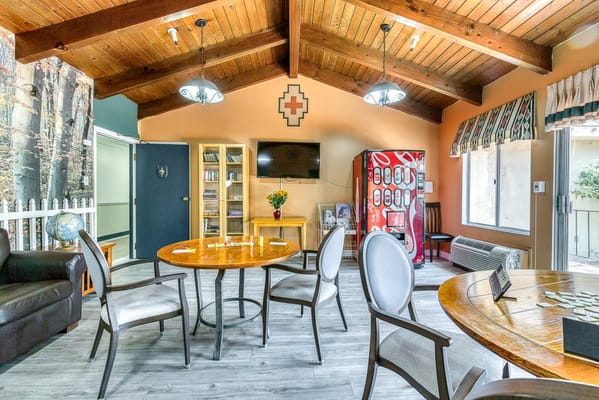 Interior view of a common area with tables and chairs