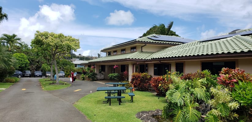 Exterior view of Kīnā ‘Ole Estate with landscaped garden