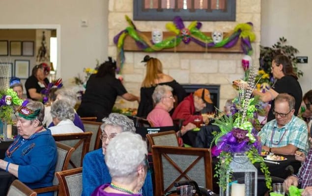 Residents celebrating in the community dining room