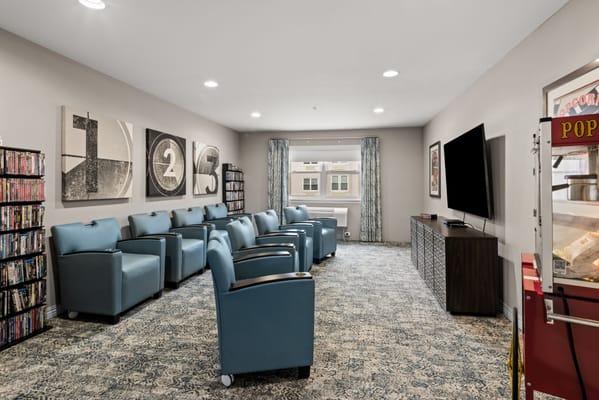 Common area with seating and a television