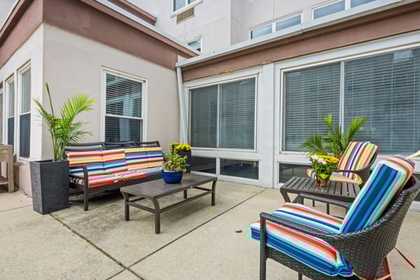 Colorful outdoor seating area with plants