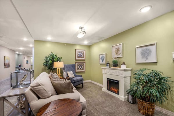 Cozy common area with seating and art decor