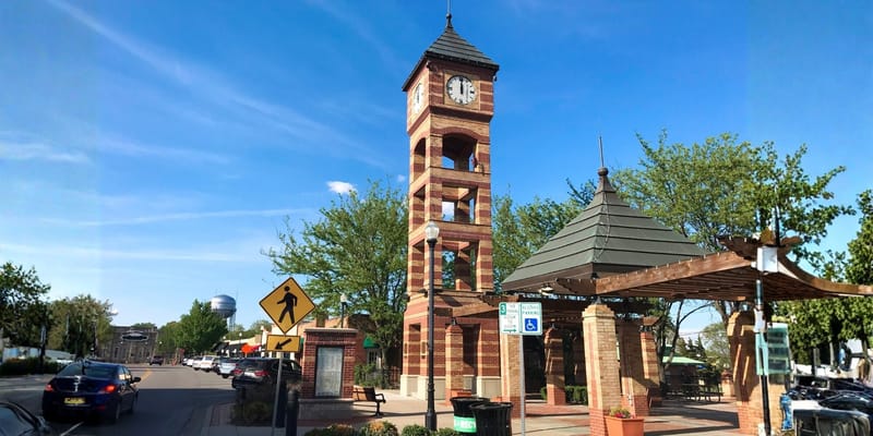 Clock tower in a landscaped outdoor area
