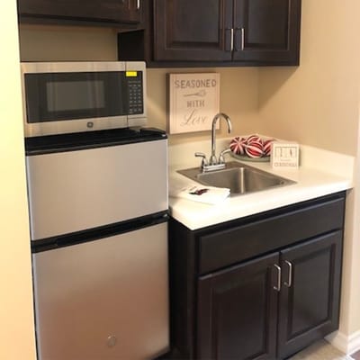 Compact kitchenette in a resident's room