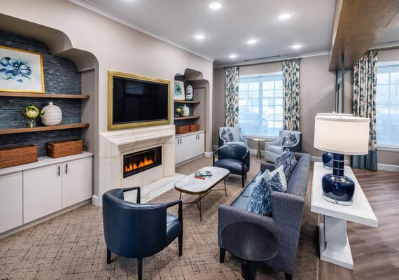 Cozy common area with comfortable seating and a fireplace