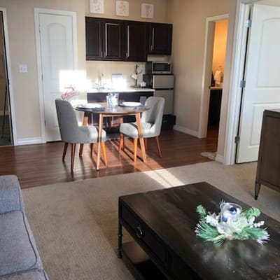 Cozy resident living area with dining table and kitchenette