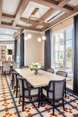Common area with dining table and decor