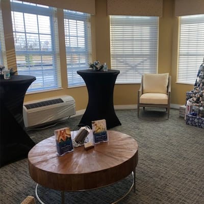 Cozy common area with a round table and a chair