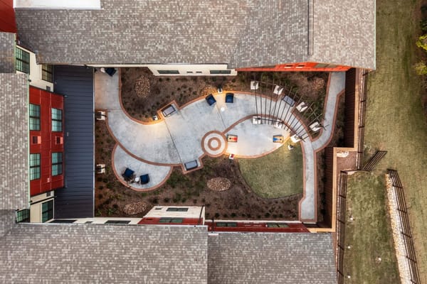 Aerial view of outdoor courtyard area with pathways and seating