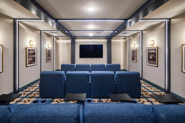 Interior view of a cozy multimedia room with seating