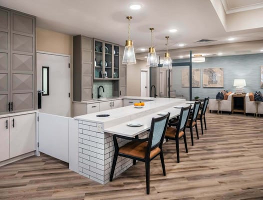 Modern common area with kitchen and seating