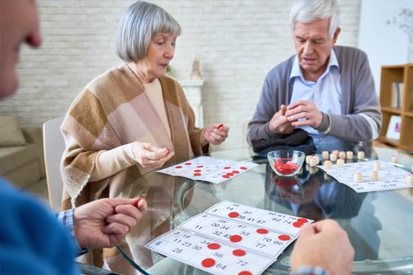 Residents playing bingo in an activity session