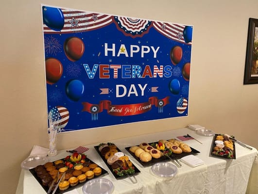 Table display for Veterans Day celebration with desserts