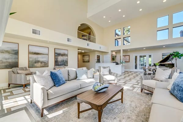 Bright and spacious common area with modern furniture
