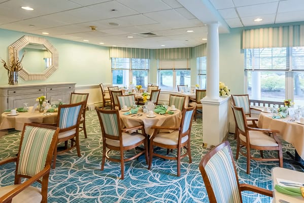 Dining room with tables set for a meal