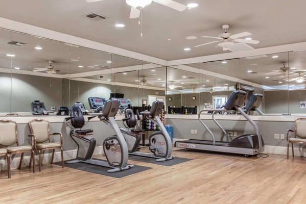 Interior view of a fitness room with exercise equipment