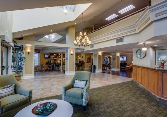 Interior view of a bright common area with seating