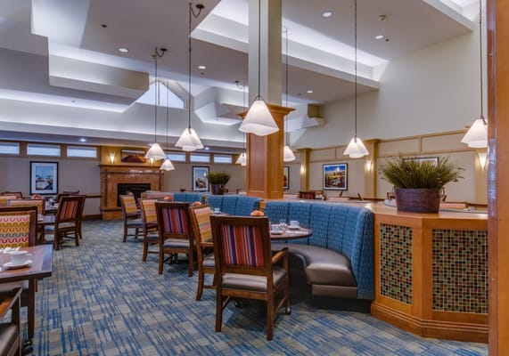 Bright dining area with booths and tables