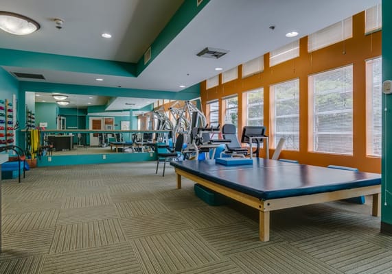 Interior view of a fitness area with gym equipment