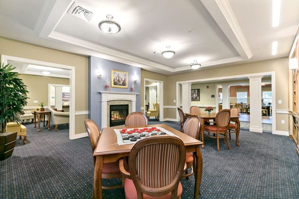 Common area with game table and fireplace