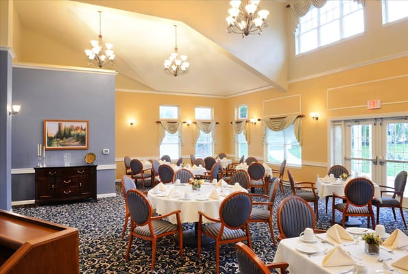 Dining room with elegant table settings and natural light