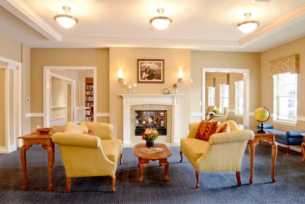 Cozy common area with seating and fireplace