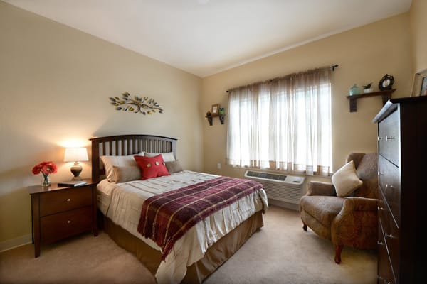 Well-decorated private room in a senior living facility