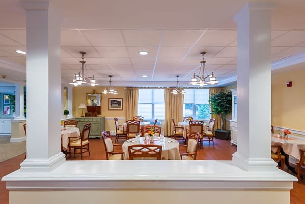 Interior dining area with tables and chairs