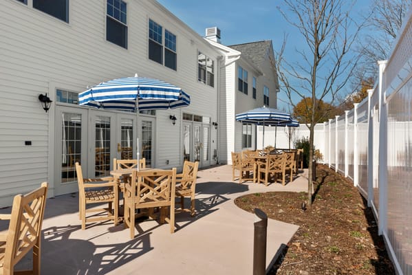 Outdoor seating area with umbrellas and tables