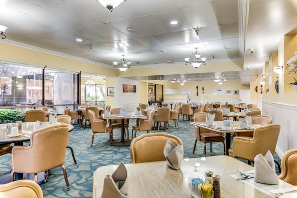 Dining area with tables set for meals