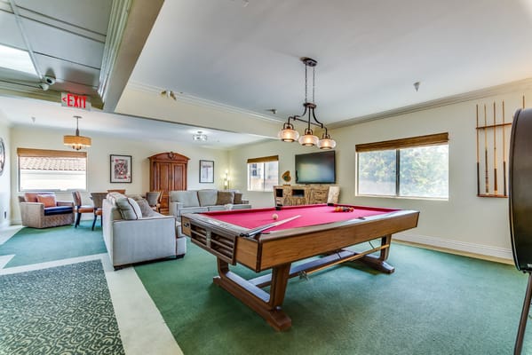 Interior common area with a pool table and seating