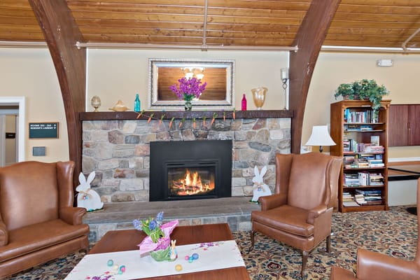Cozy common area with a fireplace and seating
