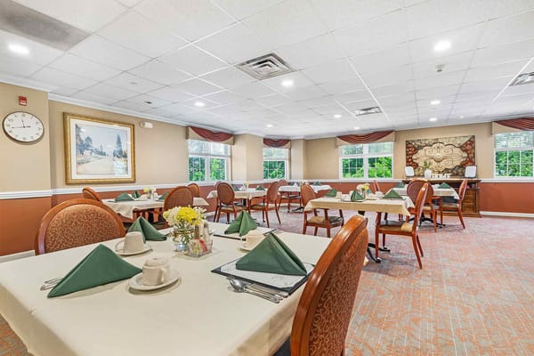 Dining area with set tables and decorative elements