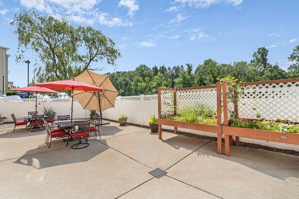 Outdoor patio with seating and flower boxes