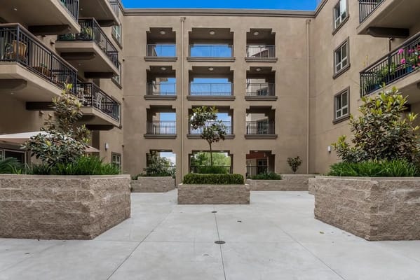 Courtyard with plants and balconies of the facility