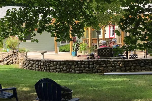 Residents enjoying the outdoor space in a garden area