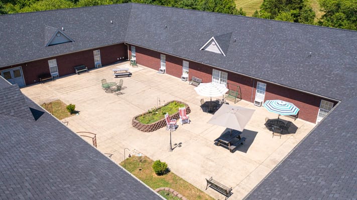 Aerial view of an outdoor courtyard with seating areas