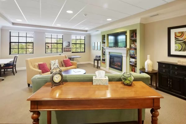 Bright common area with seating and decor