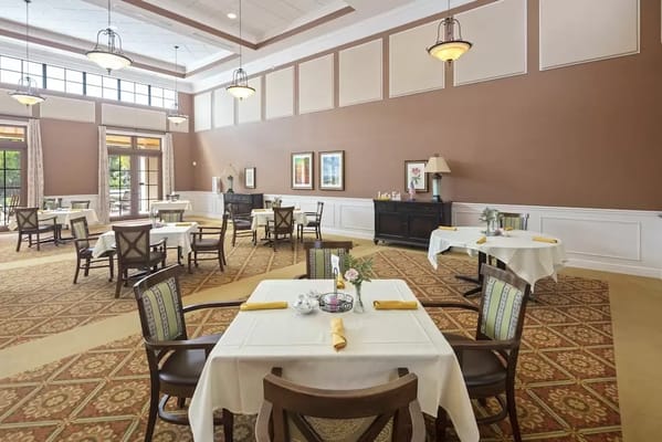 Bright and inviting dining area with tables set up