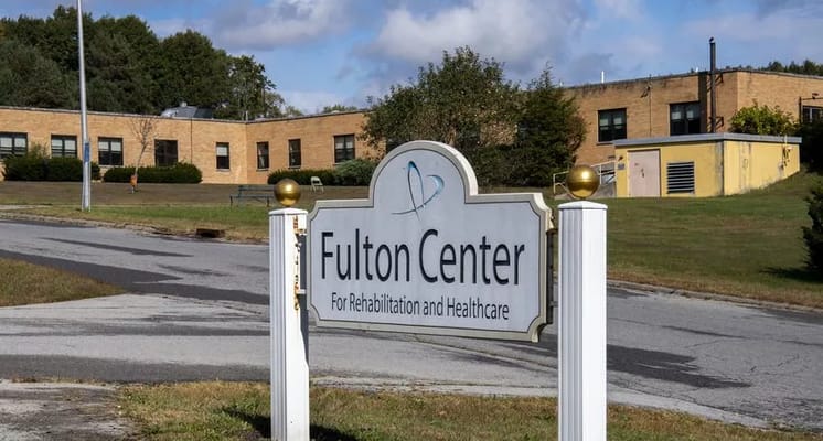 Exterior view of Fulton Center for Rehabilitation building and sign