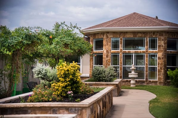 Garden area with stone pathway and shrubs