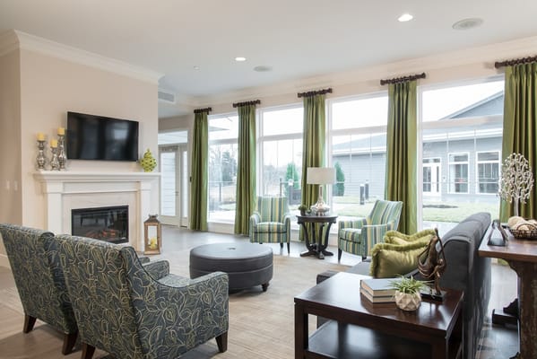 Bright common area with comfortable seating and natural light