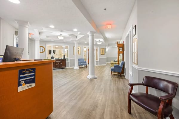 Welcoming lobby with reception desk and seating area