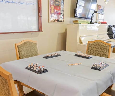 A game table with tiles ready for play.